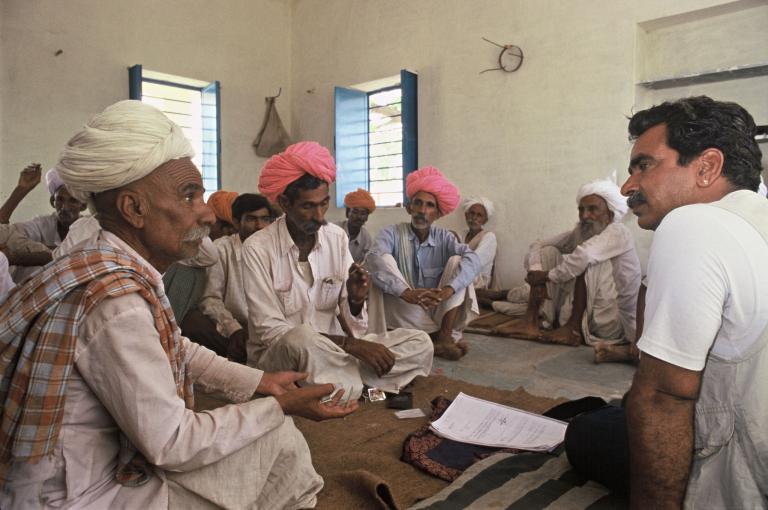 Hanwant Singh, who co-founded a welfare organization with Köhler-Rollefson to help camel herders, meets with Raika herdsmen in Jojawar, India.